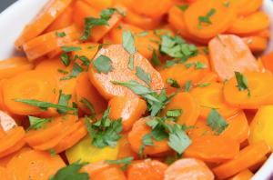 How Long To Boil Baby Carrots, a plate full of boiled carrots.